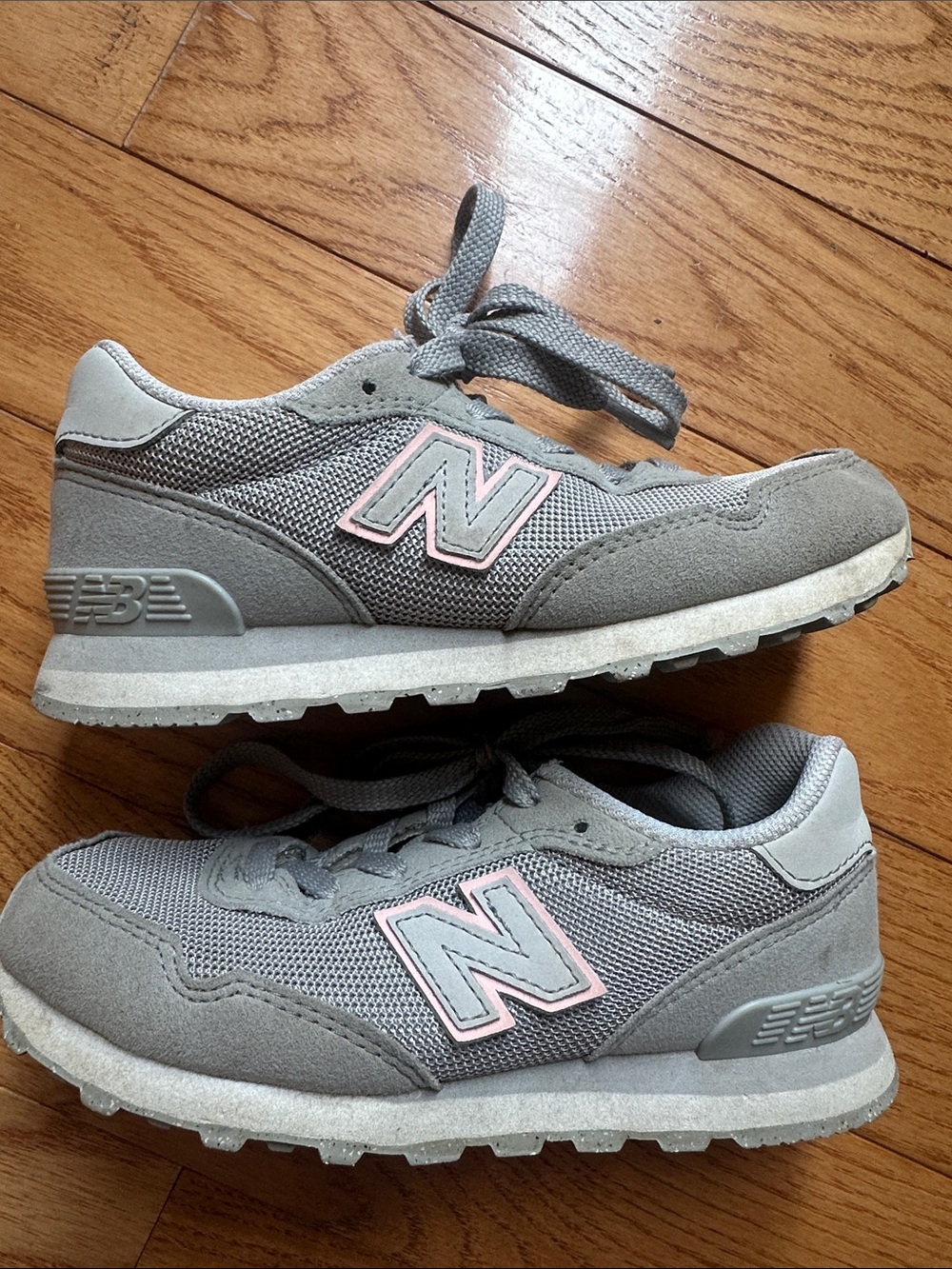 New Balance Kids Gray Sneakers with Pink Trim